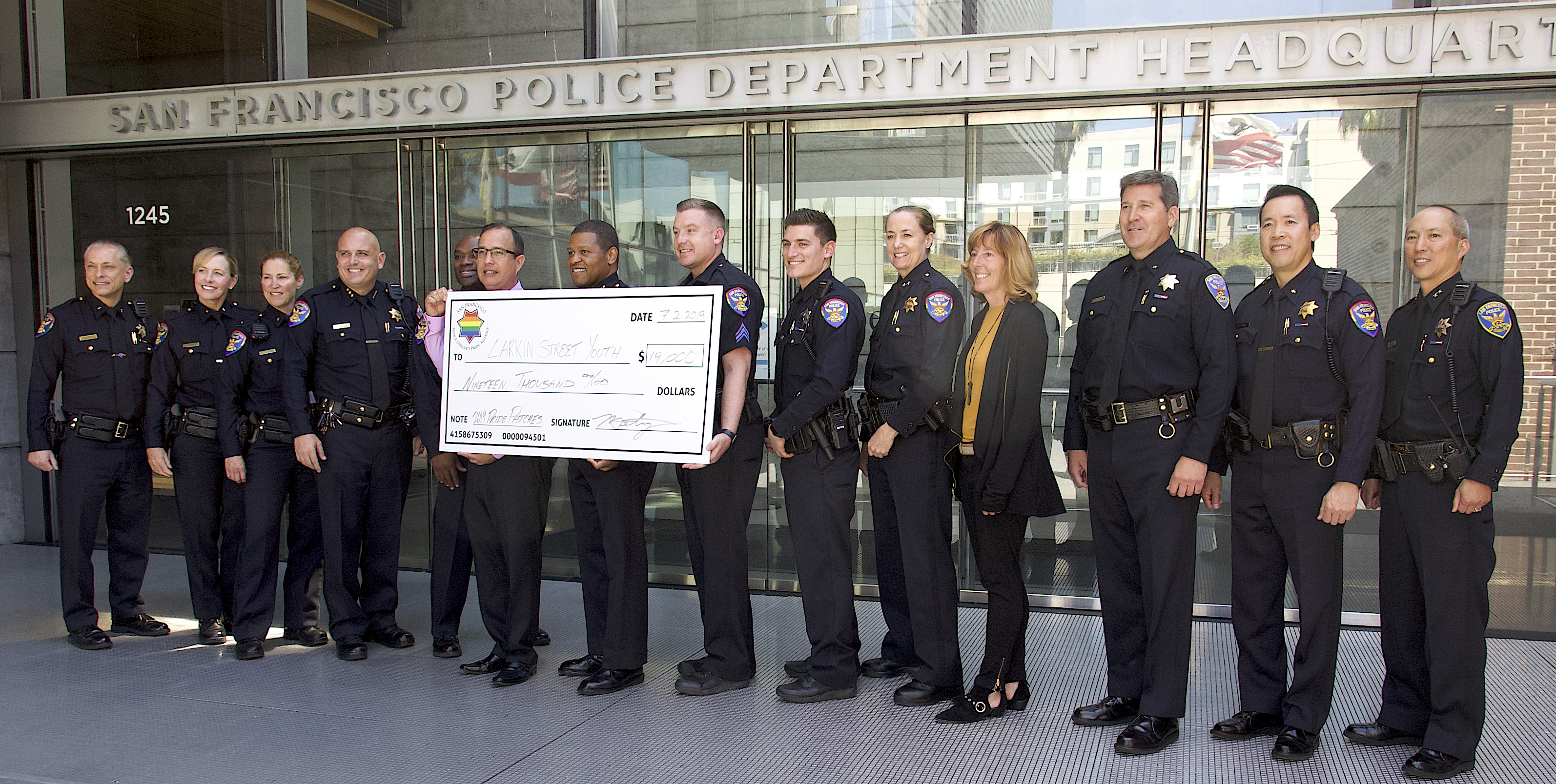 SFPD PRIDE PATCH CHECK GROUP PHOTO