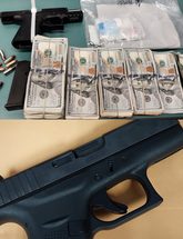 Image of weapons and narcotics seized during enforcement operation