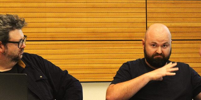 Image of members interacting during Community Policy Working Group Meeting