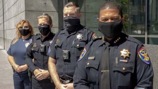 Pride Patch Project Group photo in front of PHQ