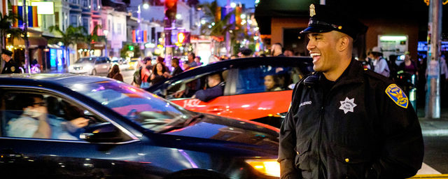 Careers - Slider 2 - SFPD Male Officer on Street at Night