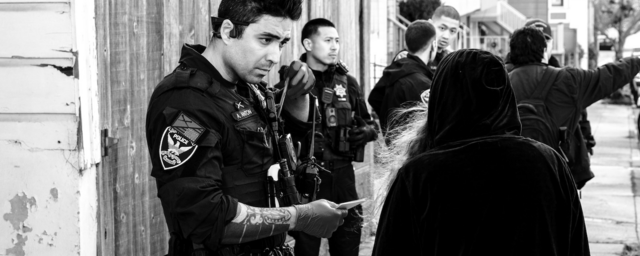 image of officers assisting a group of people
